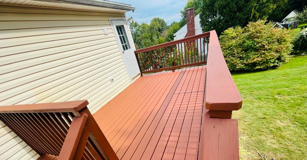 after deck painting of a house